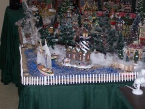 Christmas Village lake with lighthouse